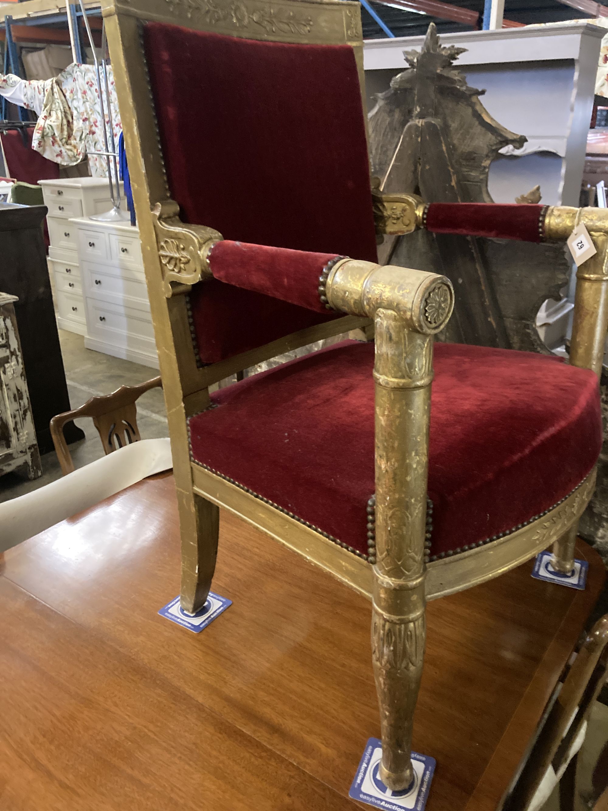 An Empire revival giltwood fauteuil, width 64cm, depth 50cm, height 98cm